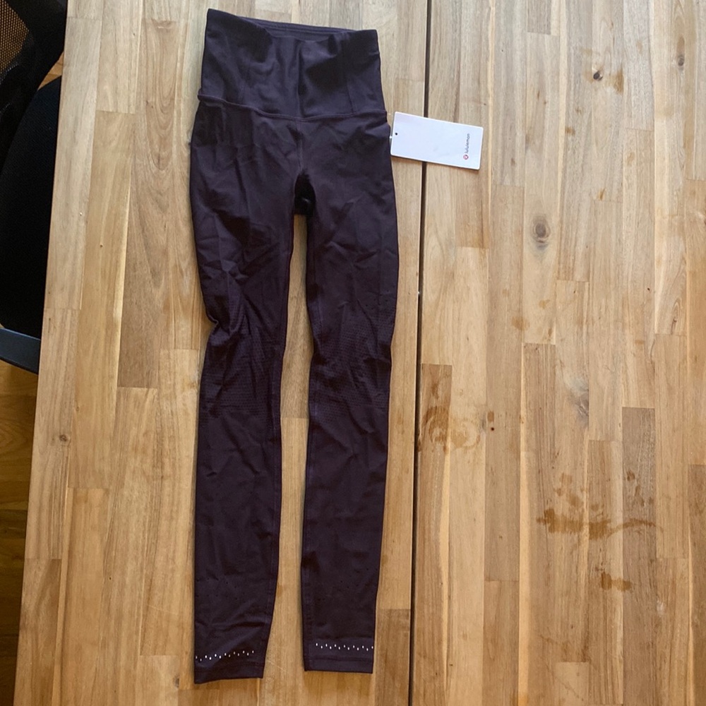Lululemon leggings dark purple in focus run tight size 2